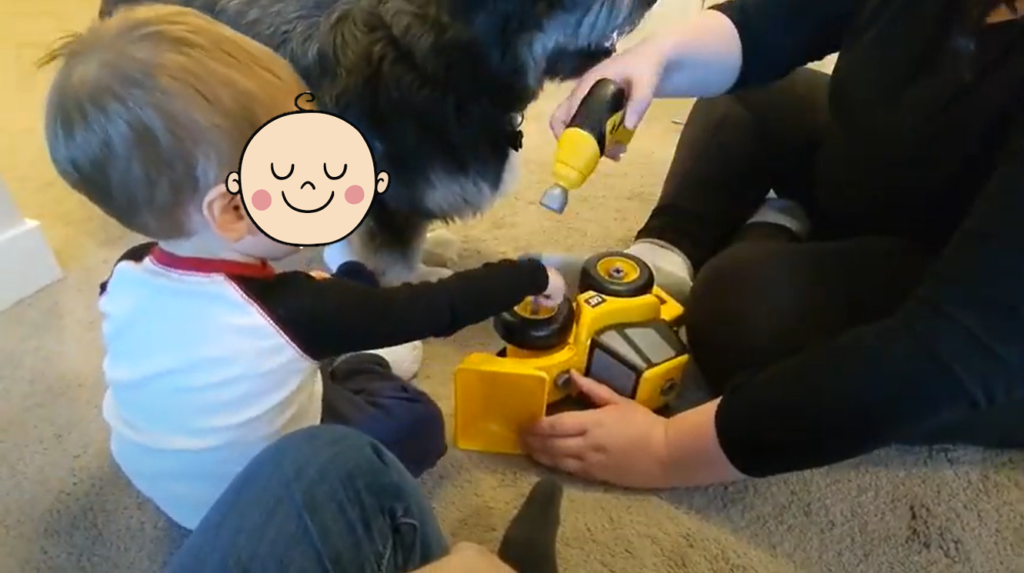 Me and my son playing on the floor.